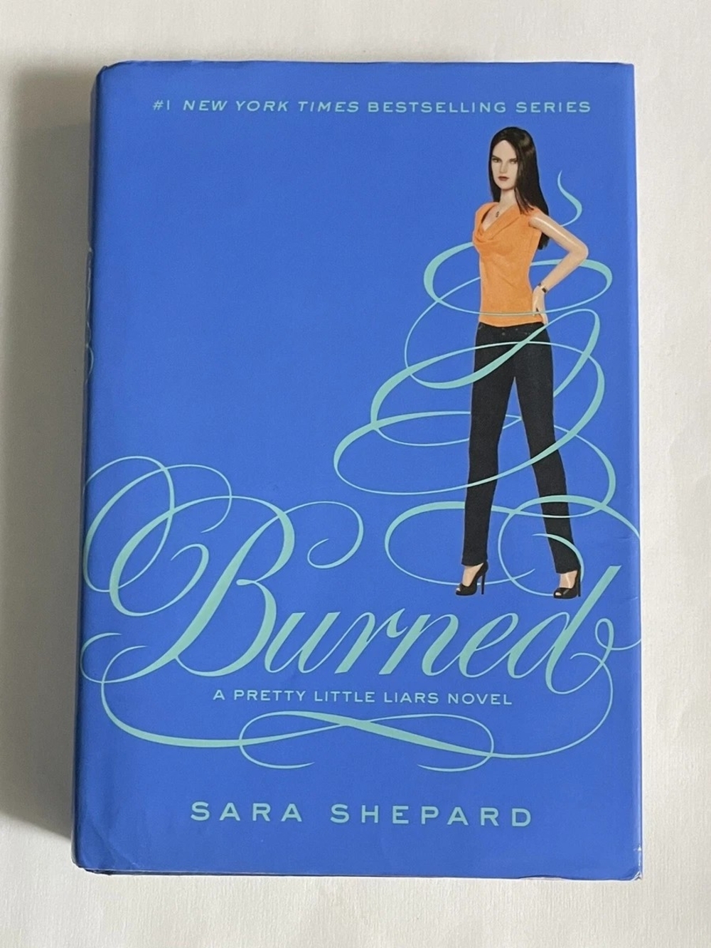 Pretty Little Liars #12: Burned by Sara Shepard (2012)